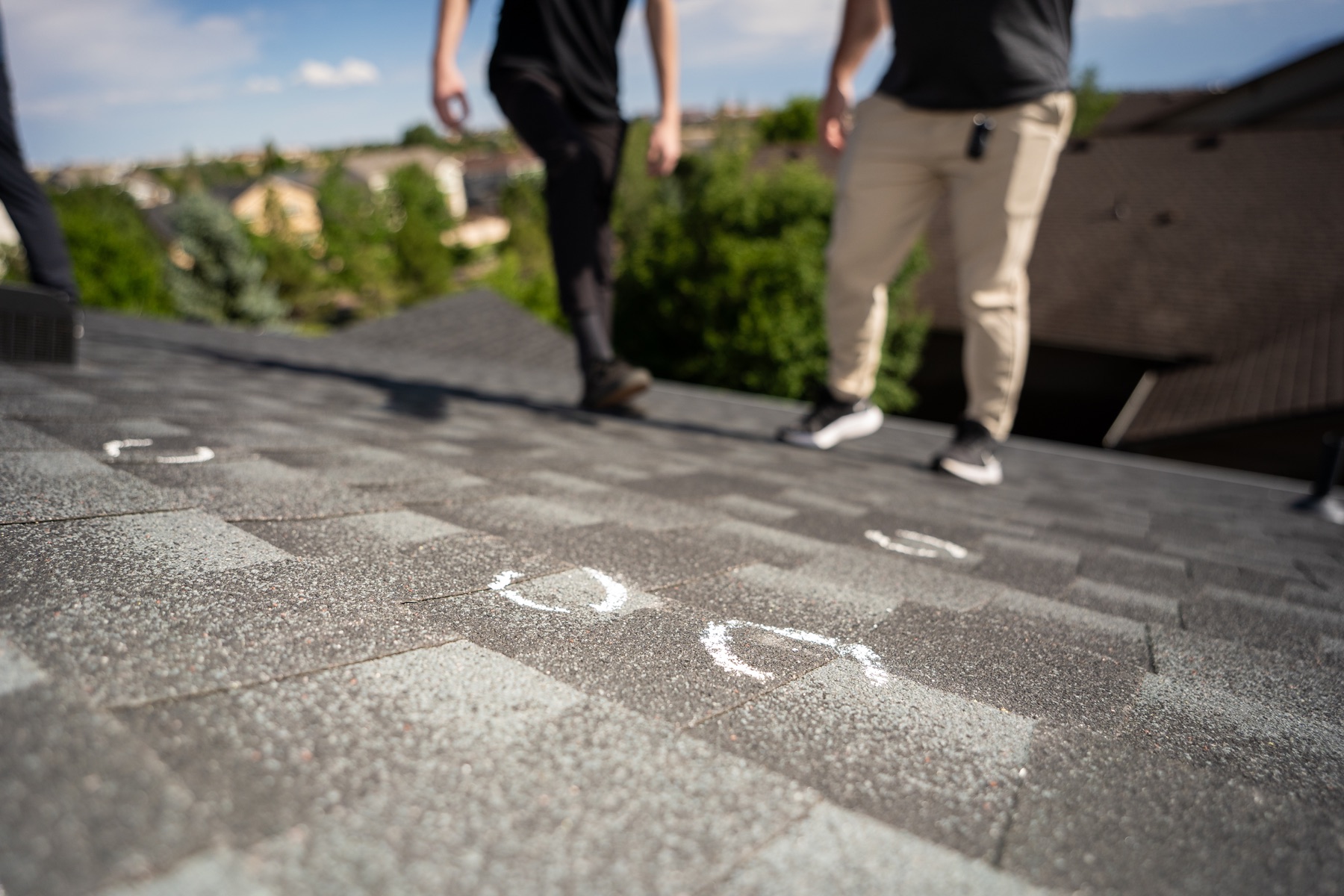 Hail damage marked during a Paragon roof inspection